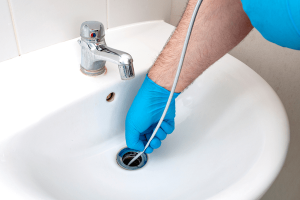 Using a Plumbing Snake on a Clogged Drain